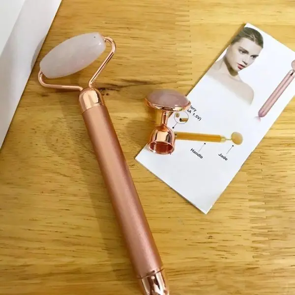 Click to view full screen Δονούμενο κυλινδρικό ρόλερ προσώπου - Facial roller photo review