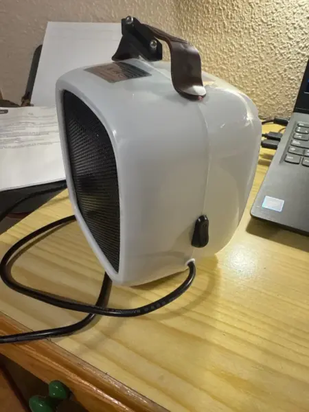 Click to view full screen Φορητό μίνι αερόθερμο 500W – WarmBlower<br><br> photo review