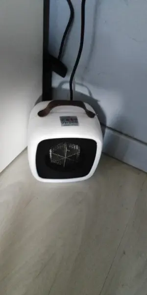 Click to view full screen Φορητό μίνι αερόθερμο 500W – WarmBlower<br><br> photo review