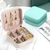 Compact mini jewelry box for organizing rings, earrings, and more