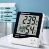 Digital thermometer and hygrometer for room with clock and alarm
